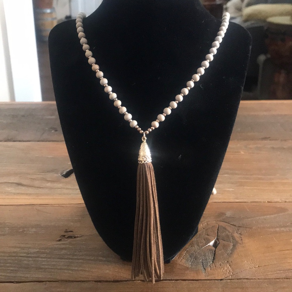 Long bead and tassel necklace